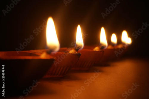 Diwali festival lamp on wooden background