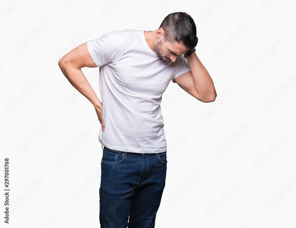 Handsome man wearing white t-shirt over white isolated background Suffering of neck ache injury, touching neck with hand, muscular pain Handsome man wearing white t-shirt over white isolated background Suffering of neck ache injury, touching neck with hand, muscular pain