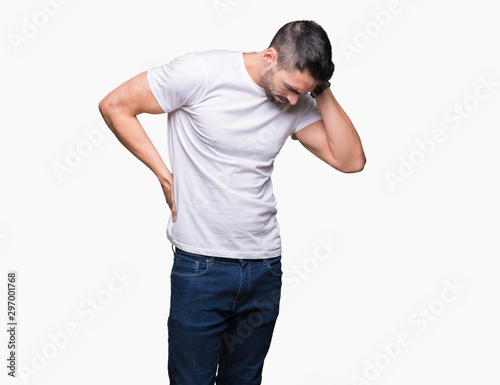 Handsome man wearing white t-shirt over white isolated background Suffering of neck ache injury, touching neck with hand, muscular pain
