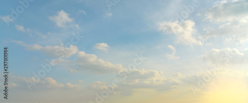 Blue sky with clouds and sunlight