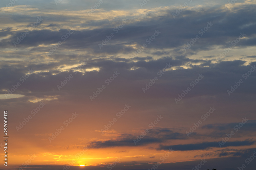 Tender cloudy sunset sky background. Silver cloud. Concept of calmness, tranquillity