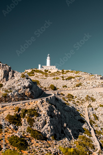 Lighthouse at the famous landmark rock on a bright sunny travel day. Cap de Formentor, Serra de Tramuntana, Mallorca, Spain , Balearic Islands