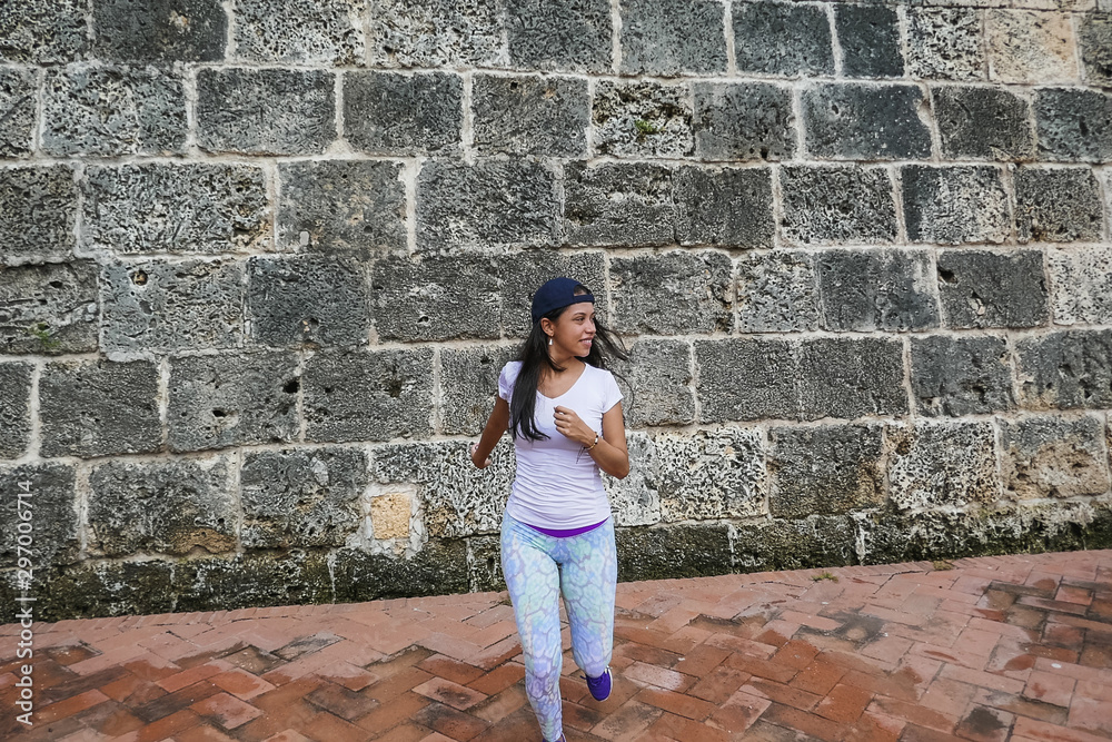 Girl running outdoors. Fitness concept Girl running outdoors. Fitness concept