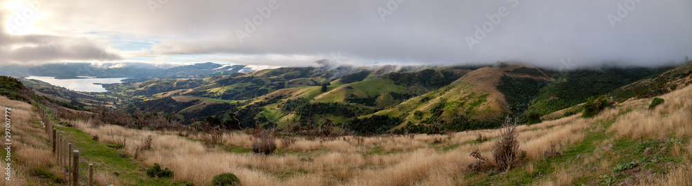 Banks Peninsula, Akaroa, Canterbury, New Zealand seen on a cloudy autumn day.