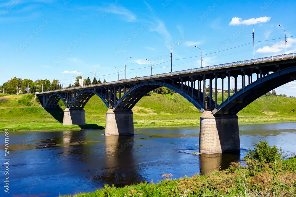 Huge metal railway bridge across the river