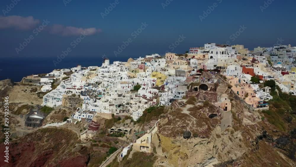 Aerial drone video of iconic village of Oia built on a cliff in famous island of Santorini, Cyclades, Greece Aerial drone video of iconic village of Oia built on a cliff in famous island of Santorini, Cyclades, Greece