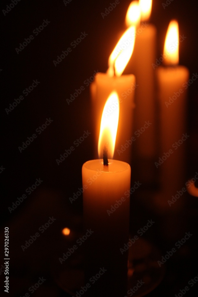 orange candles with black background