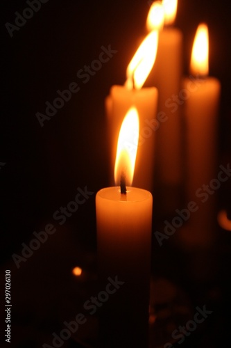 orange candles with black background
