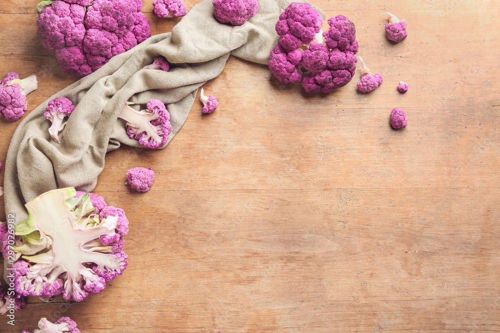 Fresh cauliflower cabbage on wooden table