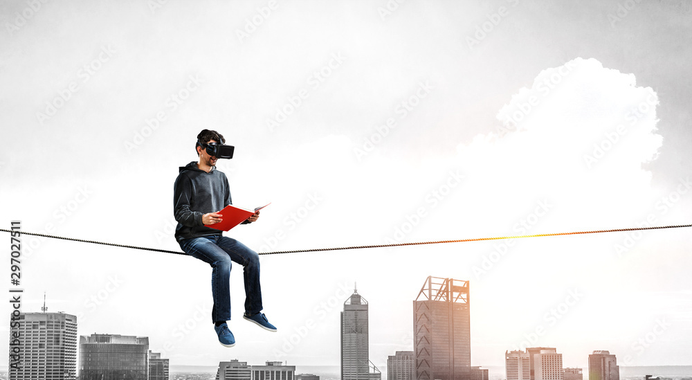 Virtual reality experience, young man in VR glasses Virtual reality experience, young man in VR glasses
