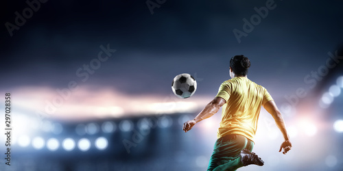 Football player plays his best soccer match © Sergey Nivens