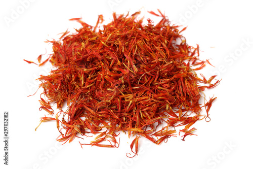 Dried safflower on white background photo