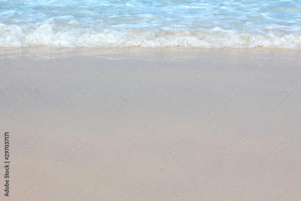 Blue Sea waves on a sandy beach