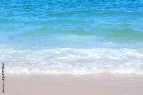 Fototapeta Naklejka Na Ścianę i Meble -  Blue Sea waves on a sandy beach
