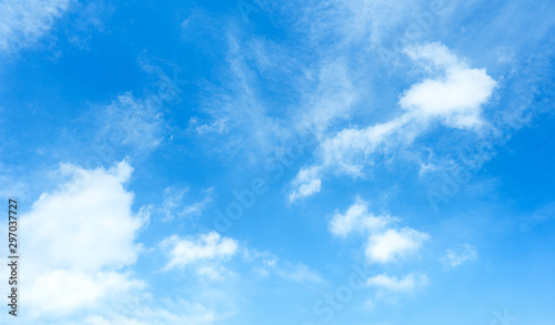 Blue sky with white clouds. Sunlight. Bright sky. Good weather. There was light shining from the clouds.
