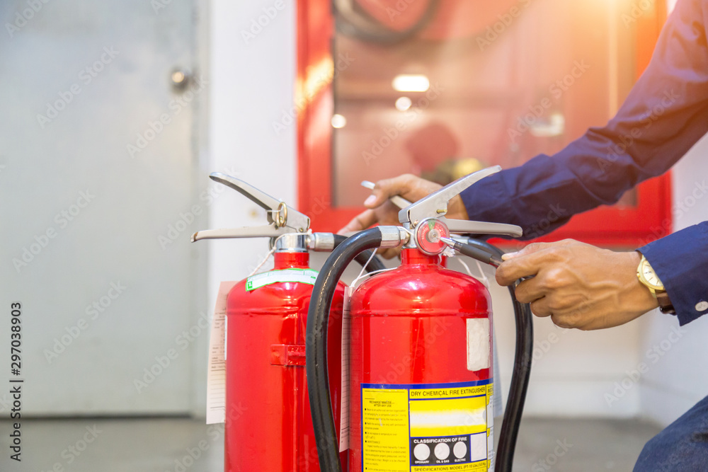 Engineer checking Industrial fire control system,Fire Alarm controller, Fire notifier, Anti fire.System ready In the event of a fire. Engineer checking Industrial fire control system,Fire Alarm controller, Fire notifier, Anti fire.System ready In the event of a fire.