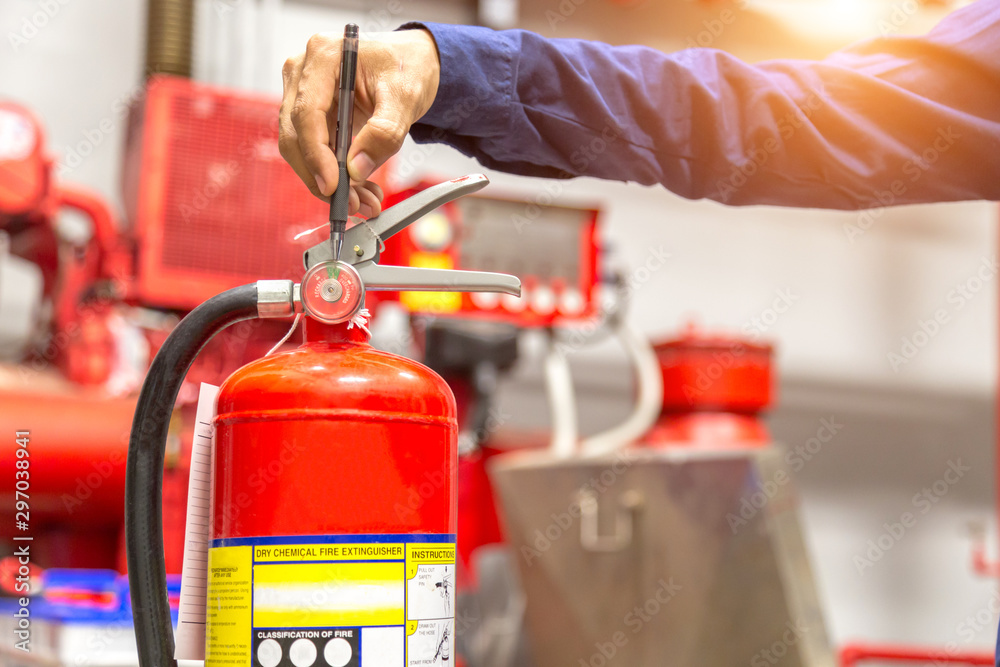 Engineer checking Industrial fire control system,Fire Alarm controller, Fire notifier, Anti fire.System ready In the event of a fire. Engineer checking Industrial fire control system,Fire Alarm controller, Fire notifier, Anti fire.System ready In the event of a fire.