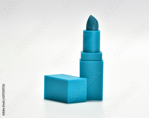 Open the lid, put blue lipstick on a white background.