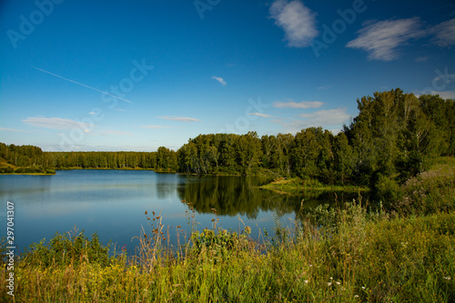 Landscape with lake and blue sky