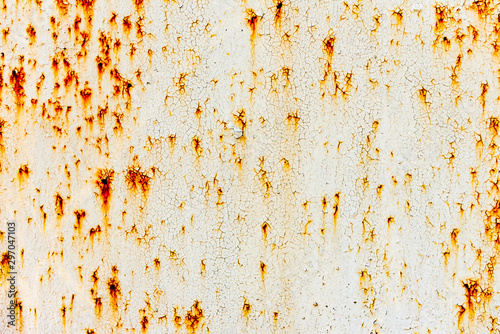 Metal texture with scratches and cracks which can be used as a background photo
