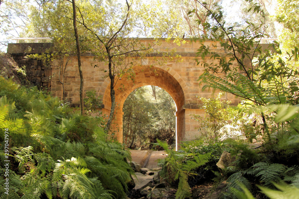 Sandstone Bridge Arch Over a River in the Blue Mountains Australia