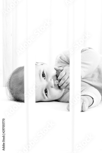 Baby girl in bed