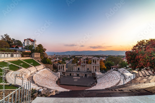 Bulgaria, Plovdiv city. Warm sunset panorama over Roman Amphitheatre in the oldest town in Europe photo