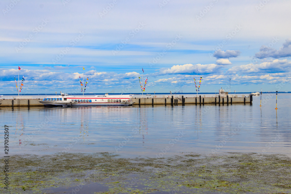 Hydrofoil boats moored at the open coast of Gulf of Finland, in Peterhof (suburb of St. Petersburg), Russia