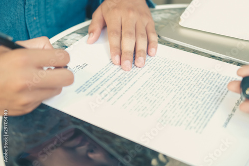 businessman signing mortgage loan contract agreement for buying home