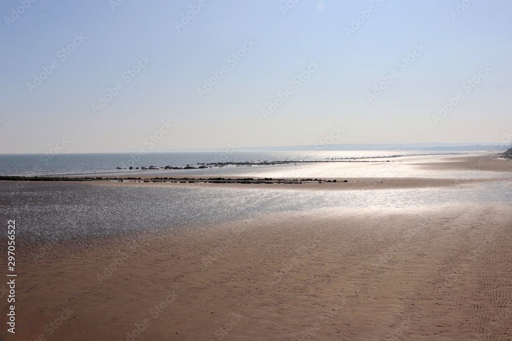 Deserted beach on a spring day with clear skies