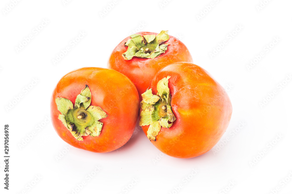 Delicious fresh persimmon fruit on wooden table. Delicious fresh persimmon fruit on wooden table.