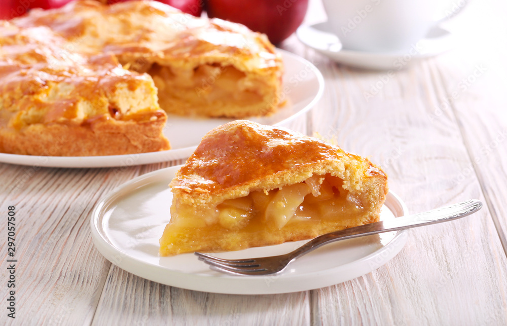 Apple pie, sliced and served Apple pie, sliced and served