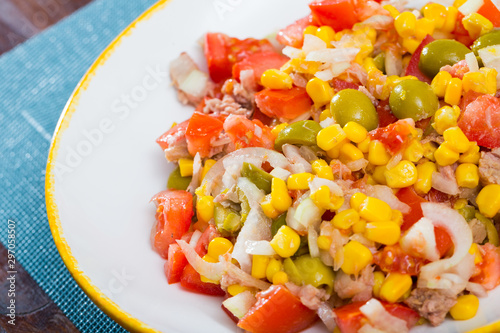 Salad with canned tuna, olives and corn