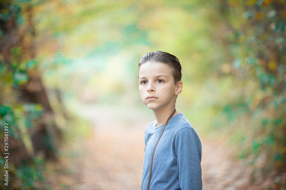 handsome boy, portrait outdoor with natural autumn background