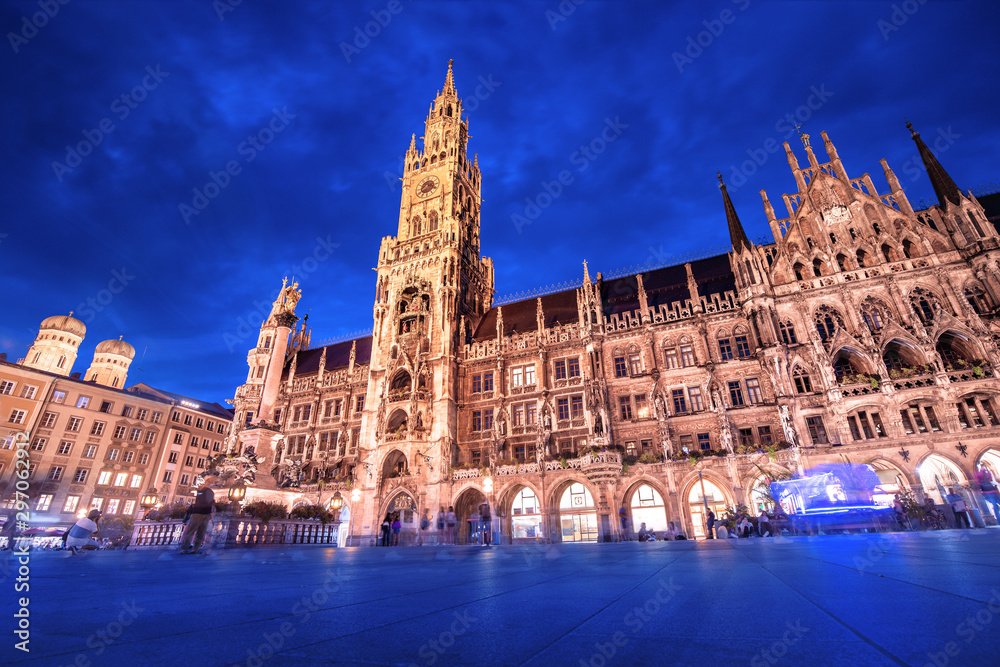 Night view of the main attraction of Munich and all of Bavaria - illuminated building of the New Town Hall at night. Tourism and Travel to Germany concept