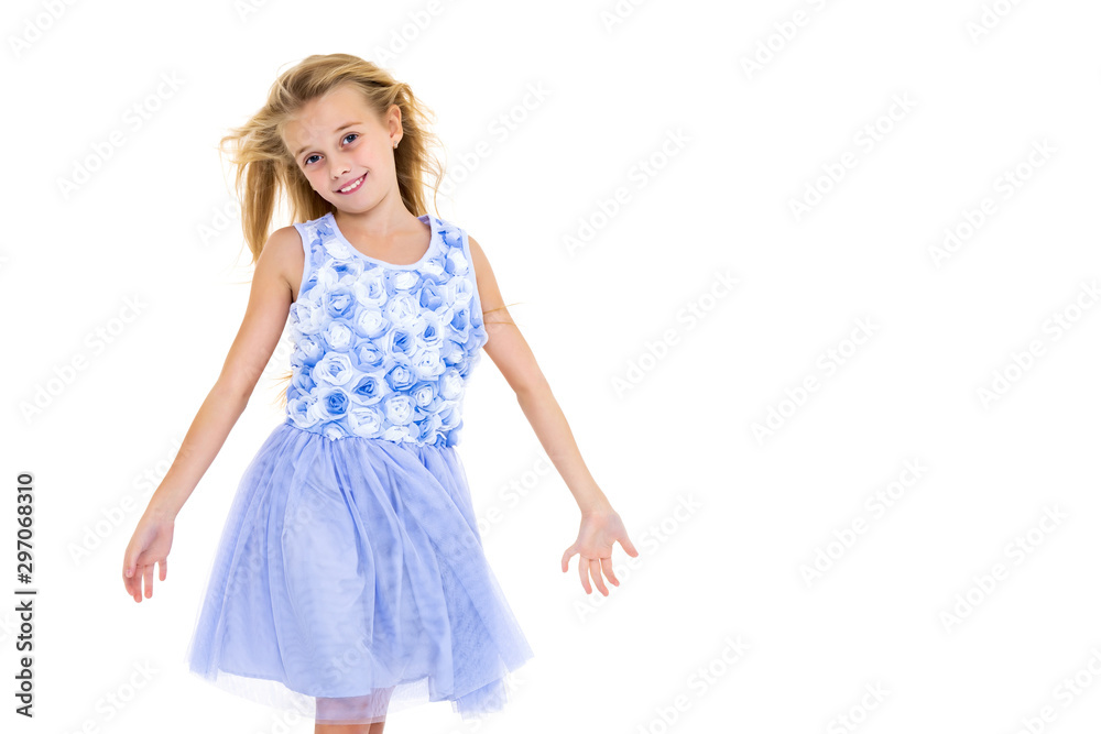 Little girl in a dress developing in the wind. Little girl in a dress developing in the wind.