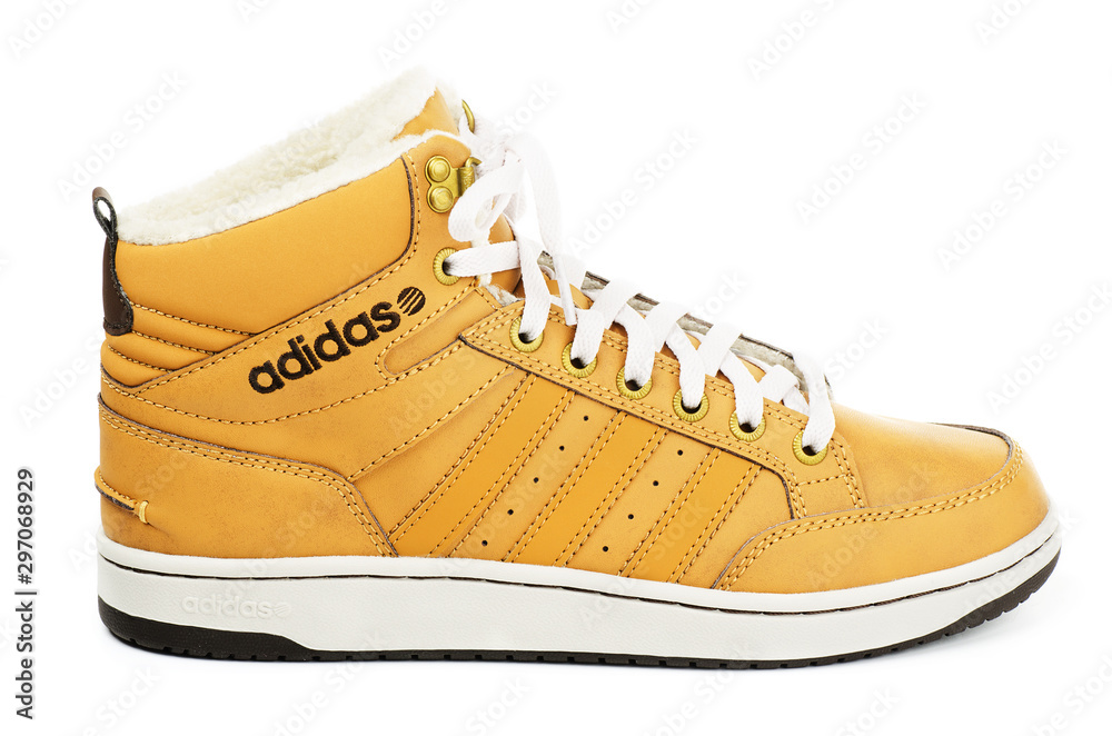 Yellow Adidas winter shoes Stock Photo | Adobe