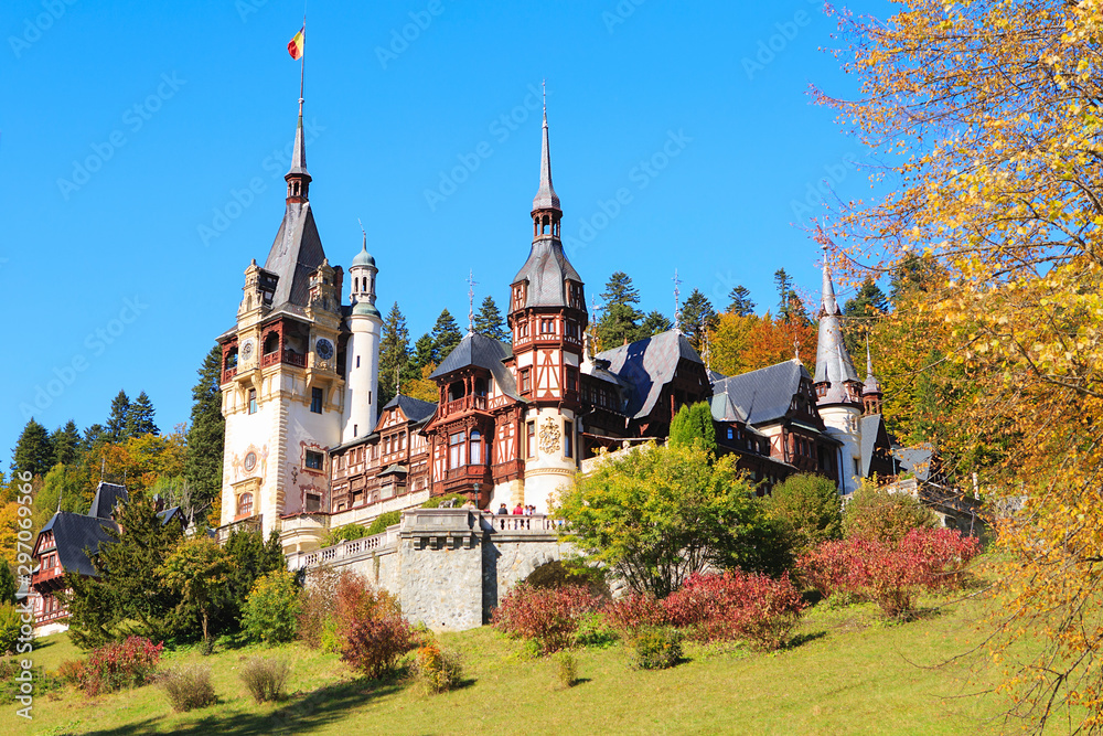 Peles Castle, Romania. Beautiful famous royal castle and ornamental garden in Sinaia landmark of Carpathian Mountains