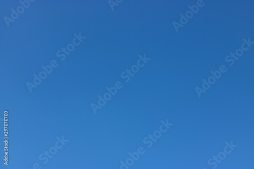 The sky was bright blue and there were no pure white clouds floating in the sky. There is space for use in the background. No clouds in the sky allow sunlight to fully penetrate to the ground.
