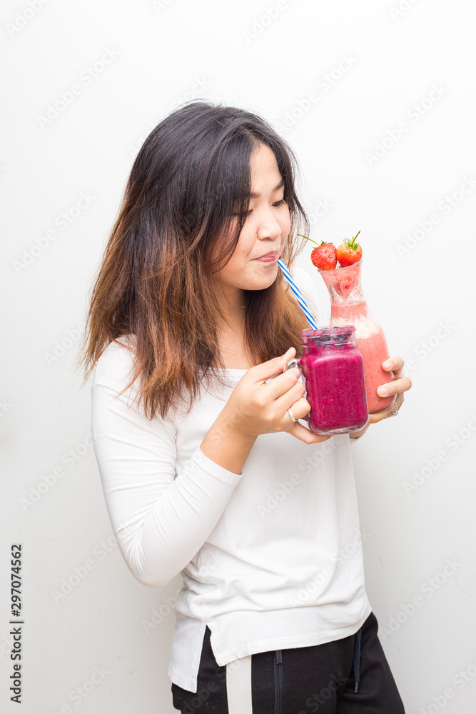 Beautiful women drinking fresh smoothies fruit Beautiful women drinking fresh smoothies fruit