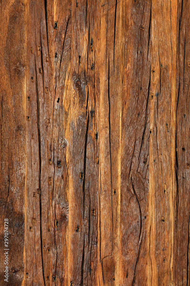 Texture and background of a very old brown wood, vertical image. Texture and background of a very old brown wood, vertical image.