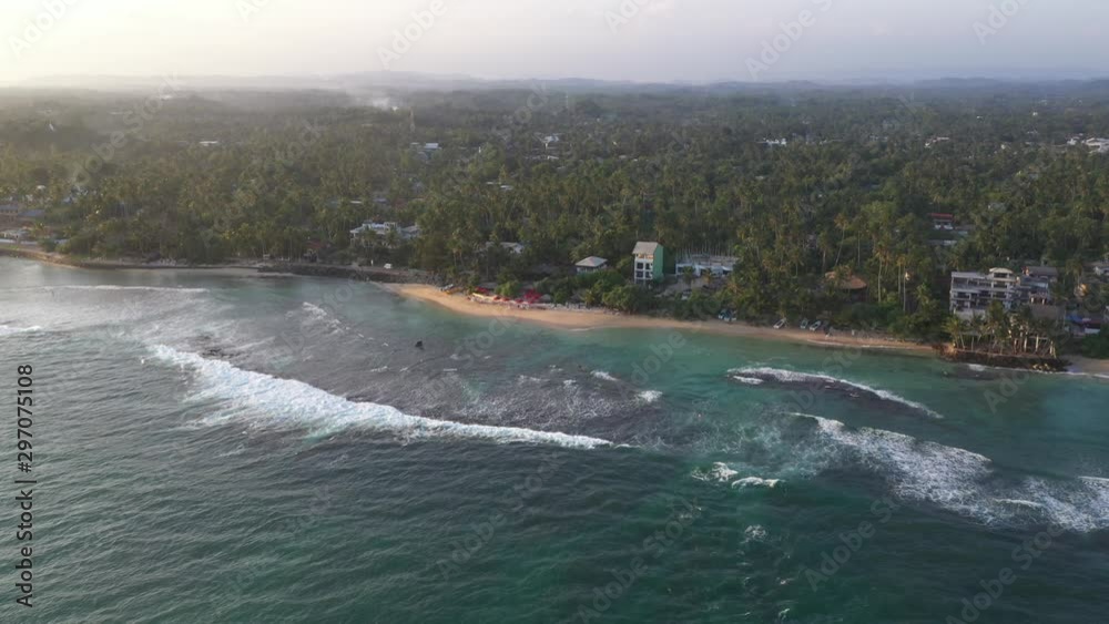 Breathtaking aerial drone shot of Sri Lanka coastline at sunset seaside Breathtaking aerial drone shot of Sri Lanka coastline at sunset seaside