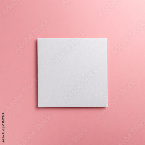 Creative layout made of paper blank on pastel on pink background. Top view. Flat lay. Copy space. Colorful background. Minimal creative concept. Trendy color