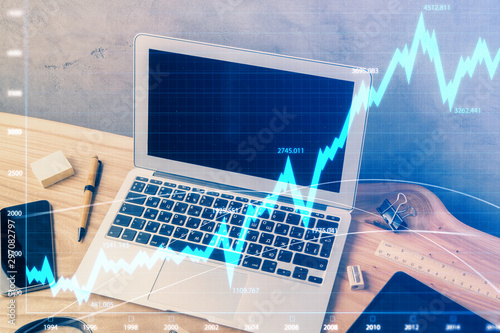 Multi exposure of chart and financial info and work space with computer background. Concept of international online trading.