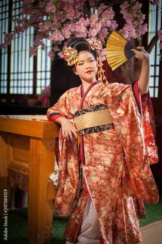 Young women wearing traditional Japanese Kimono at Japanese castle