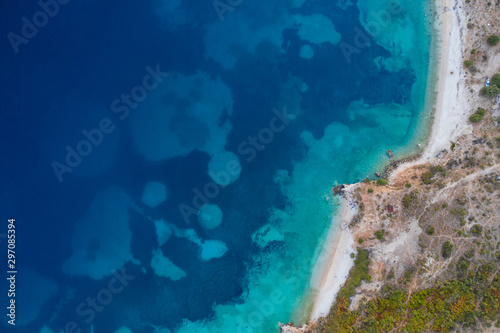 Top view aerial photo of ocean seashore with beautiful color from flying drone. Wonderful seascape with copy space for advertising text message. Perfect background for travel website Horizontal photo.