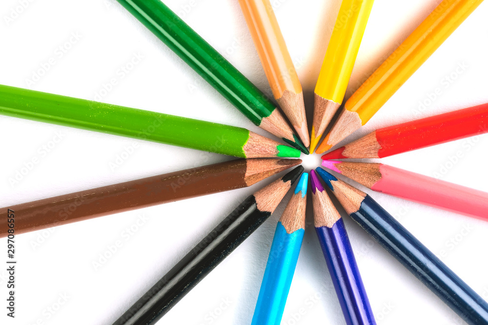 Creative concept with circle of colorful wooden pencils isolated on white background with copy space Creative concept with circle of colorful wooden pencils isolated on white background with copy space