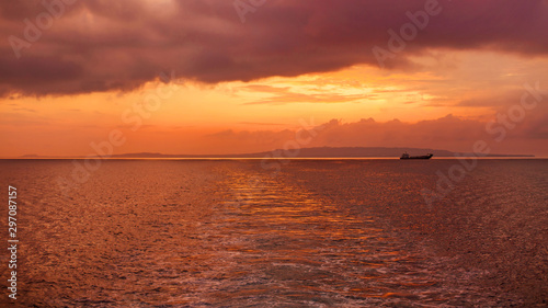 sunset over the sea and island