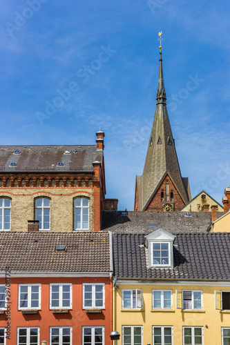 Colorful houses and church tower in Flensburg, Germany