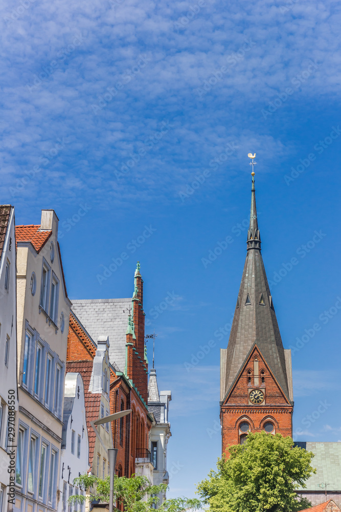 Church tower and historic facades in Flensburg, Germany